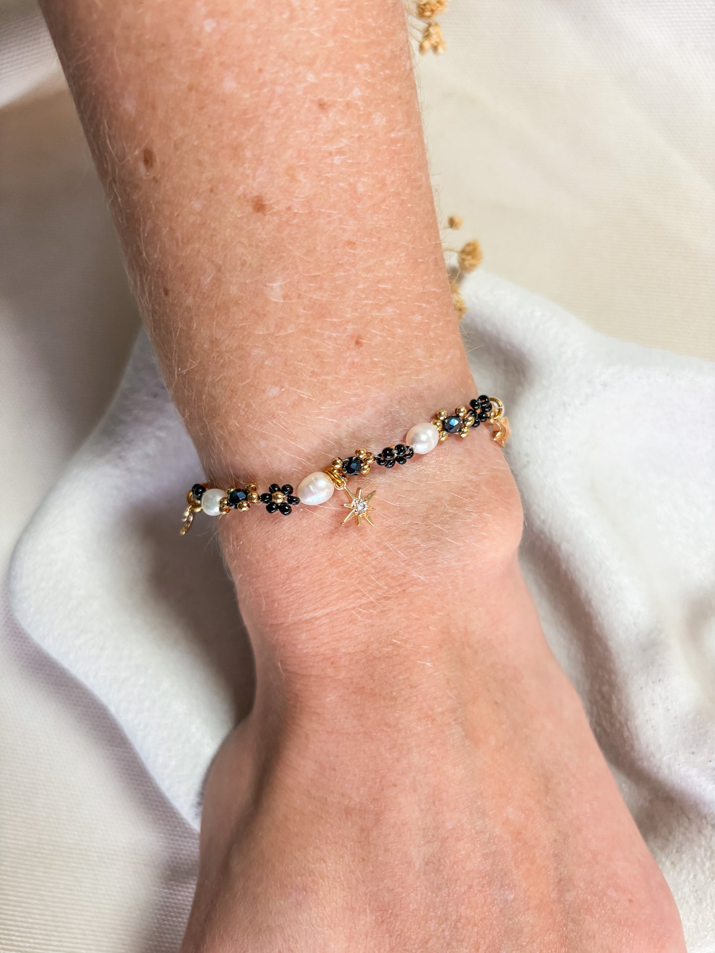 Black Beaded Flower Bracelet with Moon and Stars