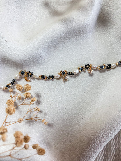 Black Beaded Flower Bracelet with Moon and Stars