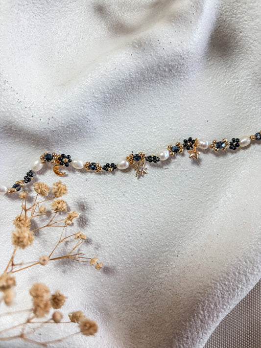 Black Beaded Flower Bracelet with Moon and Stars
